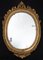 Spiegel im Neapolitanischen Empire, 19. Jh. aus vergoldetem und geschnitztem ovalem Holz 1