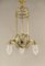 Lámpara de araña Art Déco de latón con pantallas de cristal de plomo, años 20, Imagen 1