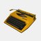 Gelbe Vintage Tippa Schreibmaschine mit lateinischen Buchstaben, 1970er 3