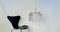 Lámpara colgante con discos de vidrio acrílico suspendidos y aros de latón, Alemania, años 60, Imagen 5