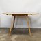 Round Blonde Beech and Elm Drop Leaf Dining Table attributed to Ercol, 1960s 6