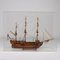 Segelschiff aus Holz in Vitrine 11