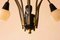 Lámpara de araña italiana en negro y latón, años 60, Imagen 9