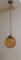 Vintage Ceiling Lamp with Golden Yellow Spherical Glass Screen of Brass Mount, 1970s, Image 1