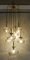 Lámpara en cascada de latón con 7 bolas de vidrio, Alemania, años 60, Imagen 2