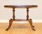 Regency Oval Yew Wood Pie Crust Edge Coffee Table on Saber Feet, Image 2