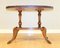 Regency Oval Yew Wood Pie Crust Edge Coffee Table on Saber Feet, Image 7