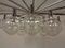Lampada grande Spider cromata con 24 sfere in vetro soffiato a mano di Ott International, Germania, anni '60, Immagine 18