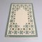 Swedish Flat Weave Rug in Soft Green Tones on Cream Background 1