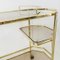 Hollywood Regency Bar Cart in Gilt Metal and Smoked Glass, 1980s 8