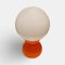 Lámpara de mesa era espacial vintage de vidrio opalino en naranja con bola de vidrio blanco, años 60, Imagen 1