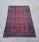 Antique Hand-Knotted Baluch Woolen Rug, 1890s 2