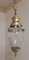 Deckenlampe mit Kristallglasschirm mit geometrischem Schliff auf verzierter Messinghalterung mit langer Kette, 1900 6