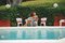 Slim Aarons, Lounging in Bermuda, Limited Edition Estate Stamped Photographic Print, 1980s, Image 1