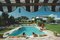 Slim Aarons, Poolside in Sotogrande, Stampa fotografica Estate Stamped Limited Edition, 1980s, Immagine 1