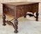 19th Century French Renaissance Hand Carved Desk or Writing Table with Carved Structure and Iron Stretcher 1
