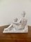 Neoklassizistischer italienischer liegender Mann aus weißem Porzellan mit Füllhorn-Skulptur 10
