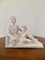 Neoklassizistischer italienischer liegender Mann aus weißem Porzellan mit Füllhorn-Skulptur 13