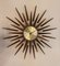 Vintage Starburst Uhr aus Teak & Messing von Seth Thomas, 1960 1