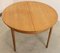 Round Extendable Dining Table 11