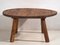 Runder niedriger Tisch aus Holz mit Metallkante 7