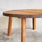 Runder niedriger Tisch aus Holz mit Metallkante 3