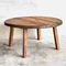 Runder niedriger Tisch aus Holz mit Metallkante 1