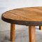 Runder niedriger Tisch aus Holz mit Metallkante 4