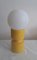 Lampada da tavolo vintage con base in ceramica gialla e paralume sferico in plastica bianca, anni '70, Immagine 1