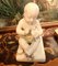 Weiße Babyfigur aus Porzellan nach Pigalle von Capodimonte, 1800 8