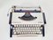 Vintage Olympia Traveler De Luxe Typewriter with Case, 1970s 1