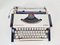 Vintage Olympia Traveler De Luxe Typewriter with Case, 1970s, Image 1