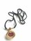 Vintage Golden and Red Stone Charm Pendant Top Necklace with Black Strings from Hermes, Image 1