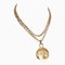 Goldene Vintage Halskette mit rundem Cc Mark Charm Anhänger oben von Chanel 1