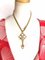 Langkettige Halskette mit Anhänger im Kreuz-Schlüssel-Design aus Kristall und Perlen von Christian Dior 1