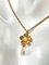 Goldene Vintage Halskette mit Perlen- und Blumenoberteil von Givenchy 1