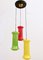 Red, Yellow and Green Three-Light Cased Glass Chandelier attributed to Vistosi, Italy 1