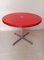 Round Red Plano Dining Table by Giancarlo Piretti from Castelli / Anonima Castelli, 1970s, Image 1