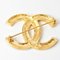 Broche CHANEL ici marque strass or 3