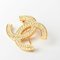 Broche CHANEL ici marque strass or 2