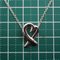 Loving Heart Pendant Necklace from Tiffany & Co. 9