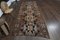 Alfombra de pasillo turca vintage geométrica marrón, años 60, Imagen 1