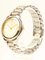 Round Face Silver and Gold Watch from Yves Saint Laurent 3