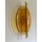 Italienische Wandlampe aus bernsteinfarbener Muranoglasscheibe und Messing Metallrahmen von Simoeng 1