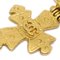 Spilla a forma di croce dorata di Chanel, Immagine 2