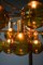 Large Chandelier in Brass and Amber Glass attributed to Hans-Agne Jakobsson, 1950s 10
