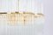 Gilt Brass and Crystal Glass Rods Chandelier attributed to Palwa, 1970s 6