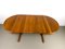 Danish Round Extendable Dining Table in Teak, 1980s 2