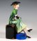 Lady with Pekingese Sitting on a Suitcase by Dakon for Goldscheider, Vienna. 1936 2