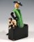Lady with Pekingese Sitting on a Suitcase by Dakon for Goldscheider, Vienna. 1936 3
